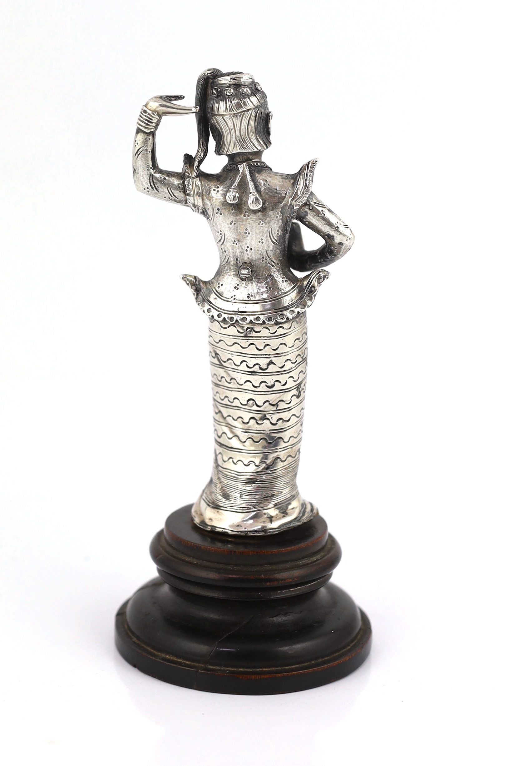 A Burmese cast silver model of a dancer, late 19th century